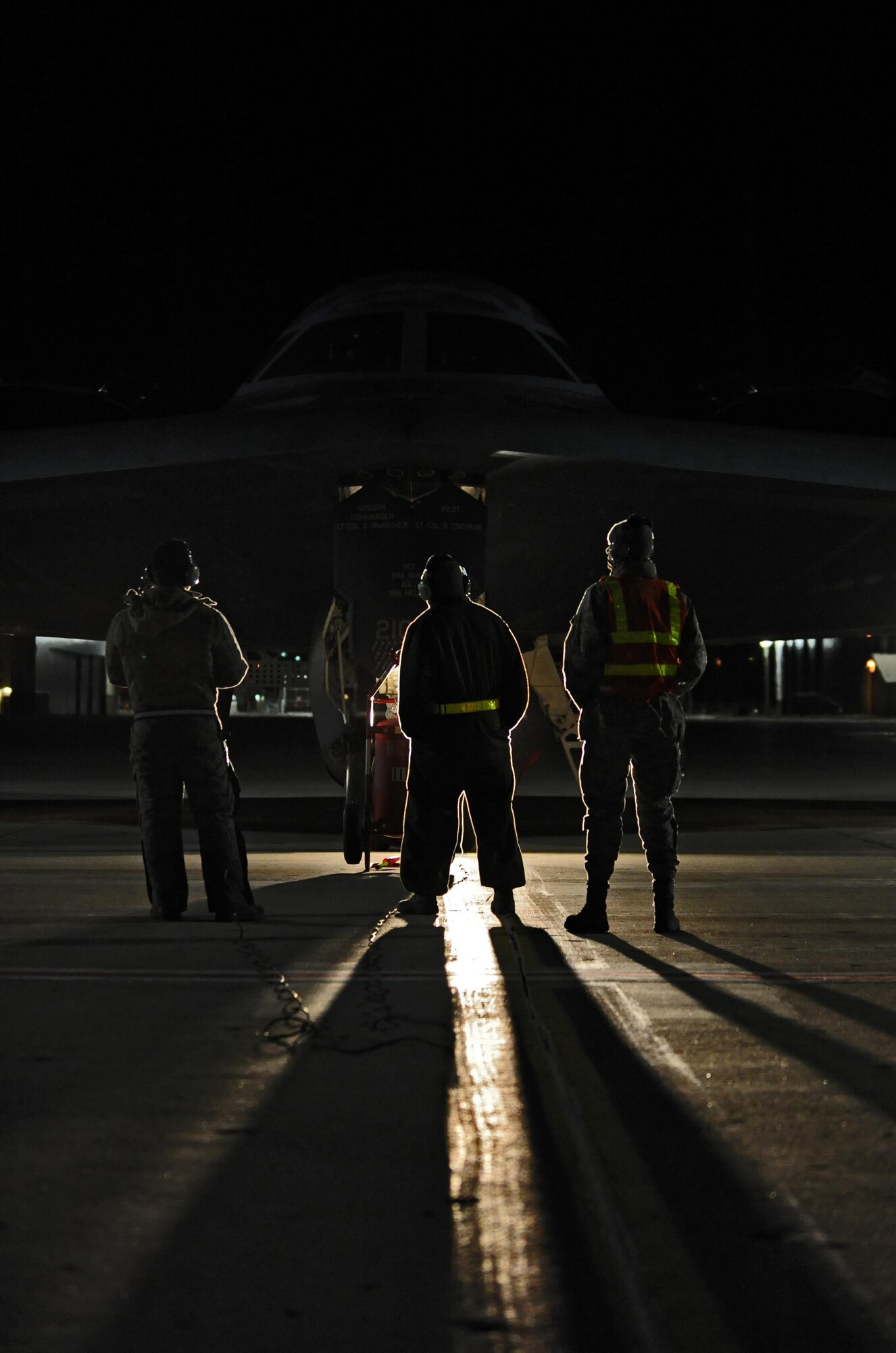 U.S. Air Force Senior Airman Michael Saulsberry, (left to right), Senior Airman Detroy Brooks, and Airman First Class Andrew Dutton, 509th Aircraft Maintenance Squadron crew chiefs, perform final inspection on a B-2 Spirit at Whiteman Air Force Base, Mo., Feb. 2, 2016, prior to take off during Red Flag (RF) 16-1. RF, based out of Nellis AFB, Nev., allows participating units to exchange tactics, techniques and procedures as well as improve interoperability. (U.S. Air Force photo by Tech. Sgt. Miguel Lara III)