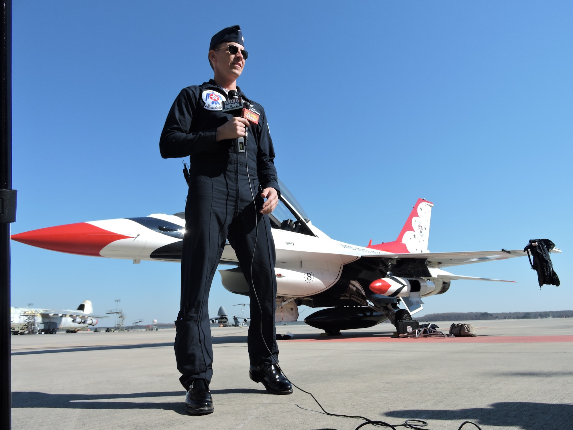 “There’s a ton of work that your community members are putting into the air show that’s coming up in October, and it starts this far out,” Maj. Scott Petz, the team’s advance pilot and narrator, said. “We want to make sure your airfield is ready to go for the show, and it is – it looks great.”  Maj. Petz and Staff Sgt. Conrad Nelson, a Thunderbirds tactical aircraft maintainer, were here to perform a site survey of Robins in advance of the team's scheduled performance during the Robins Thunder over Georgia Air Show Oct. 2 and 3. (U.S. Air Force photo by Roland Leach)
