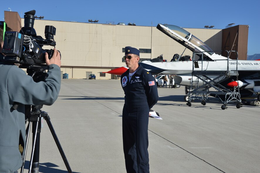 Thunderbirds pilot Maj. Scott Petz speaks to local media during a visit to Kirtland Feb. 10.  He was at the base for an advance site survey, as the Thunderbirds are scheduled to perform at the Kirtland Air Show June 4-5. (Photo by Jamie Burnett)