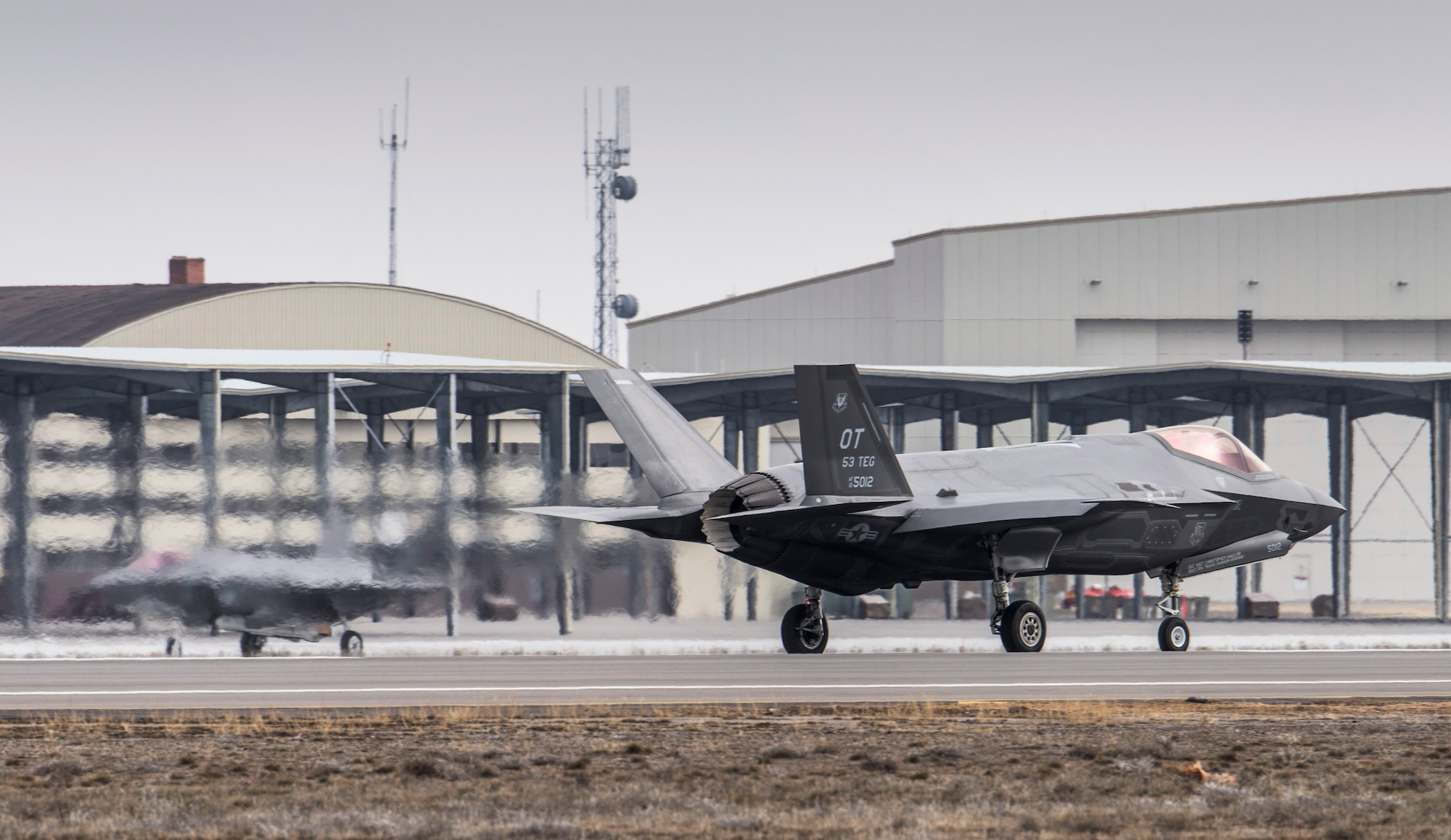 Two F-35A Lightning IIs taxi after landing at Mountain Home Air Force Base, Idaho, Feb. 8. The F-35s, visiting from Edwards AFB will be part of an initial operating capability test at the nearby range complex. (U.S. Air Force photo/Tech. Sgt. Samuel Morse)