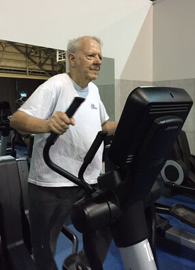 Charles Elias, 80, retired as a civil servant from the Sensors Directorate, Wright-Patterson AFB. He visits Wright Field Fitness Center three days per week and plans his exercise routine so he is working a different set of muscle groups each day. (Skywrighter photo/Amy Rollins)