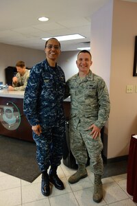 U.S. Navy Adm. Cecil D. Haney (left), U.S. Strategic Command (USSTRATCOM) commander, and U.S. Air Force 2nd Lt. Jonathan Racey, a KC-46 production engineer assigned to the Air Force Life Cycle Management Center tanker directorate at Wright-Patterson Air Force Base, Ohio, pose for a photo, Feb. 11, 2016, during USSTRATCOMâ€™s Bomber and Tanker Stakeholders Conferences at Scott Air Force Base, Ill., Feb. 11-12. During the event, Haney and U.S. Air Force Gen. Robin Rand, Air Force Global Strike Command (AFGSC) commander; U.S. Air Force Gen. Carlton D. Everhart, Air Mobility Command commander; and other general officers held discussions with AFGSC wing commanders and deputy commanders as part of their continuing collaborative effort to develop the next generation of leaders. These recurring forums are designed to assess the health and direction of the nation's strategic forces, including ICBM, ballistic missile submarine, bomber and supporting tanker forces, as well as sensors and communication networks. Racey graduated from the University of Nebraska Lincoln (UNL) College of Engineering in 2014. The University of Nebraska - which operates the National Strategic Research Institute (NSRI), one of only 13 Department of Defense-sponsored University Affiliated Research Centers (UARCs) in the nation - works closely with Haney and his command through USSTRATCOMâ€™s Deterrence and Assurance Academic Alliance. One of nine DoD unified combatant commands, USSTRATCOM has global strategic missions, assigned through the Unified Command Plan, which include strategic deterrence; space operations; cyberspace operations; joint electronic warfare; global strike; missile defense; intelligence, surveillance and reconnaissance; combating weapons of mass destruction; and analysis and targeting. (USSTRATCOM photo by U.S. Navy Capt. Pamela S. Kunze)