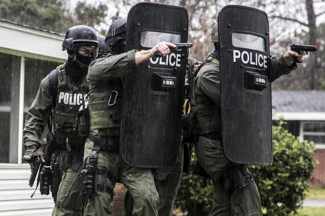 A Marine special response team conducts hostage scenario training in Laurel Bay, S.C., Feb. 4, 2016. The team responded by using personal protective equipment and tactics. Marine Corps photo by Lance Cpl. Jonah Lovy