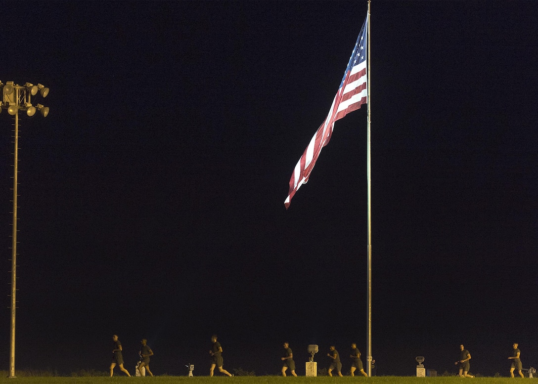 Army Command Sgt. Maj. John W. Troxell, senior enlisted advisor to the chairman of the Joint Chiefs of Staff, runs during a morning physical training session with sailors and Marines at Camp H.M. Smith, Hawaii, Feb. 10, 2016. DoD photo by Navy Petty Officer 2nd Class Dominique A. Pineiro