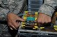 Staff Sgt. Jesse Contreras-Laurel, the 379th Expeditionary Maintenance Squadron electronic systems test set team leader from San Bernardino, Calif., tests a signal data convertor at Al Udeid Air Base, Qatar Feb. 9, 2016. The 379th EMXS avionics flight performed 56 maintenance inspections over the past six months. (U.S. Air Force photo manipulation /Tech. Sgt. James Hodgman)