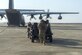Members of the 100th Logistics Readiness Squadron move a forward area manifold cart out of the back of an MC-130J Commando II, assigned to the 67th Special Operations Squadron, during forward area refueling point training at Plovdiv, Bulgaria, Feb. 9, 2016. The FAM cart weighs approximately 3,500 pounds and is mainly extracted from the aircraft. (U.S. Air Force photo/Airman 1st Class Luke Kitterman)