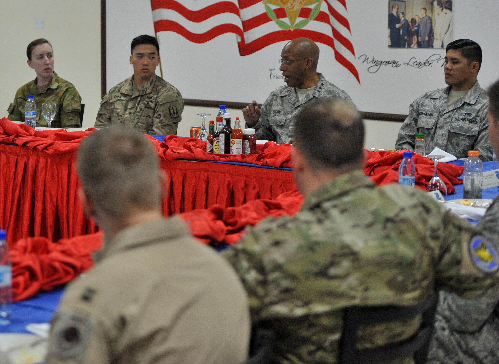 Lt. Gen. Charles Brown Jr., commander of Air Forces Central Command, speaks to a group of Airmen, Soldiers and coalition members during a luncheon at an undisclosed location in Southwest Asia, Feb. 11, 2016. Brown is responsible for developing contingency plans and conducting air operations in a 20-nation area of responsibility covering Central and Southwest Asia. (U.S. Air Force photo by Staff Sgt. Kentavist Brackin/released) 