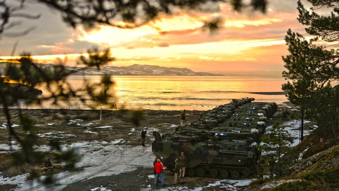 U.S. Marine Corps amphibious assault vehicles before a public "splash" demonstration in the Trondheim Fjord in Norway, Jan. 10. The partnership between the Norwegian military and U.S. Marines enables NATO to pivot toward crisis by alleviating logistics requirements to support a broad-spectrum military operations.