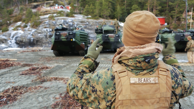 U.S. Marine Corps amphibious assault vehicles line up by the Trondheim Fjord, Norway, Jan. 9. These vehicles from the Marine Corps Prepositioning Program-Norway will support exercise Cold Response 16, scheduled for later this month, with crisis response equipment including M1A1 battle tanks, amphibious assault vehicles, artillery, and logistics equipment drawn from Norwegian caves.