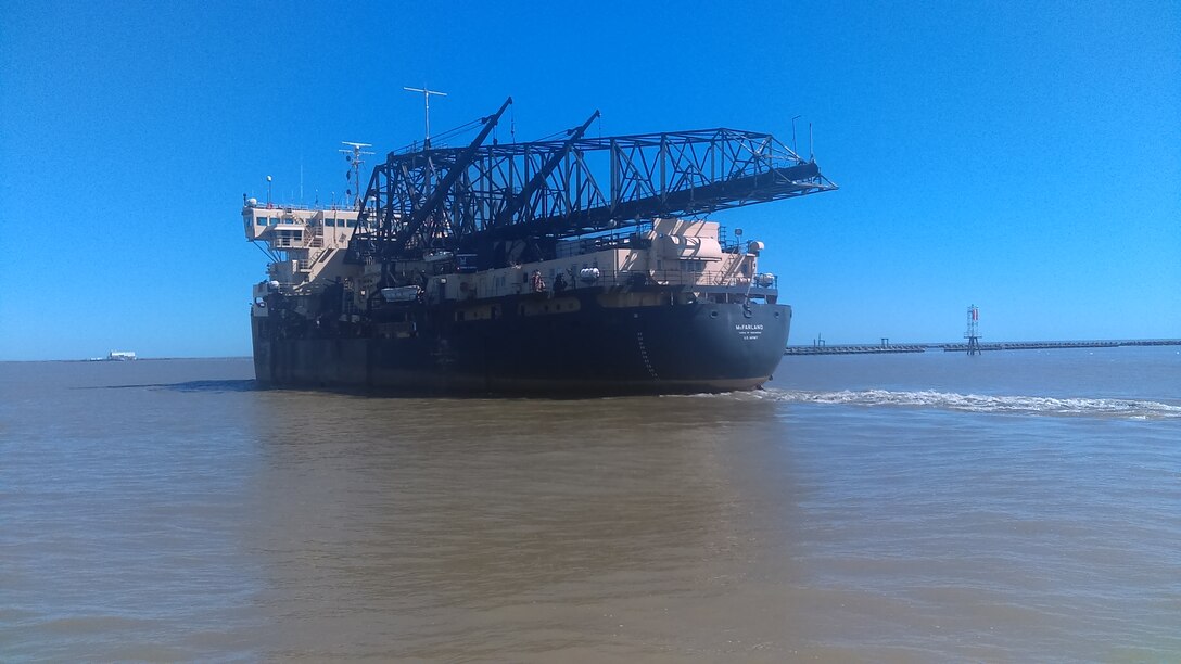 The Hopper Dredge McFarland works to keep the deep draft channel open in the lower Mississippi River.