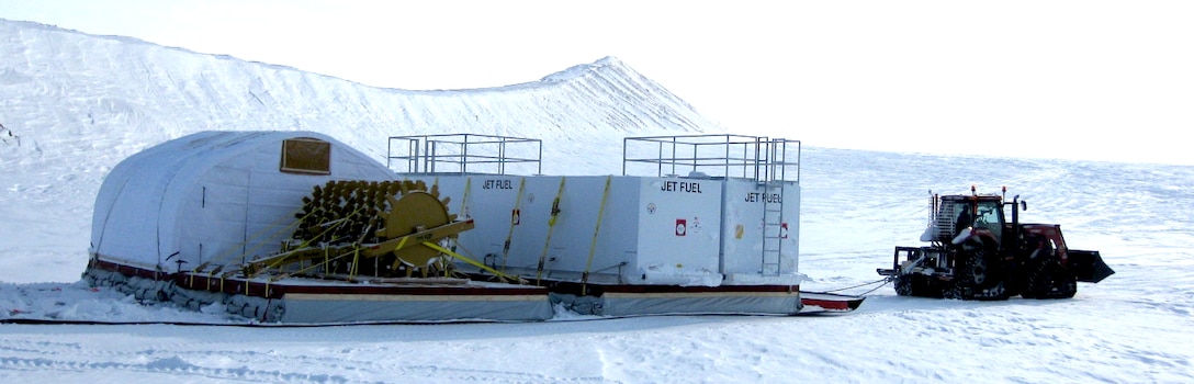 The 2012 Greenland traverse delivered two large fuel-storage tanks and a heavy roller-compactor to Summit Station by using lightweight cargo sleds developed by CRREL.