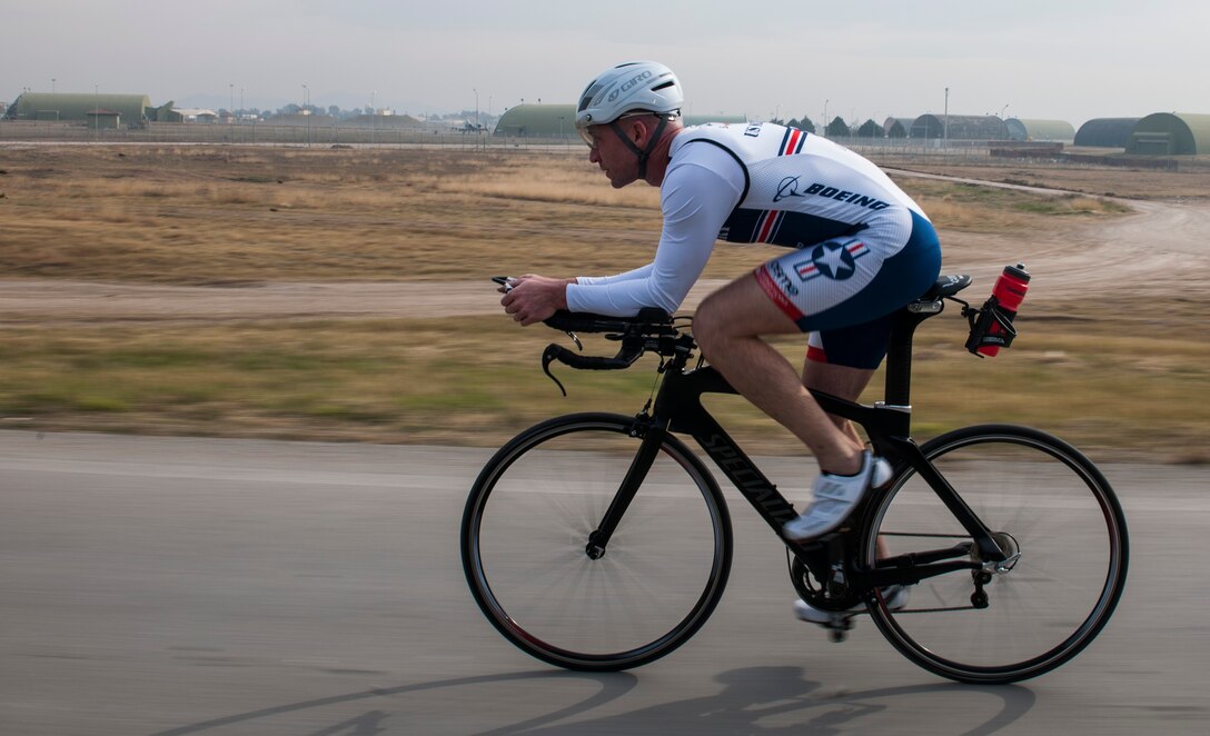 Air Force Senior Master Sgt. Jason Chiasson, 39th Communications Squadron production superintendent, trains for the Air Force Cycling Team on Incirlik Air Base, Turkey, Dec. 10, 2015. Chiasson regularly rides laps around the flightline to achieve 25 to 100 miles per training session. Air Force photo by Senior Airman Krystal Ardrey