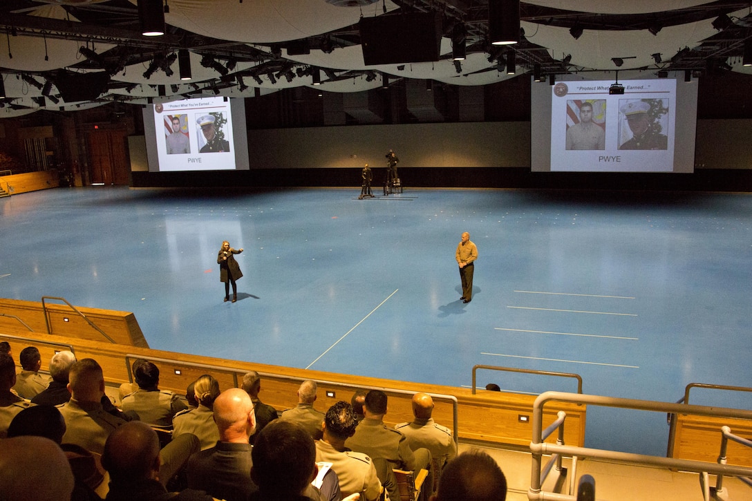 Elizabeth Davis, wife of a deceased Marine, talks to Marines gathered to hear the Commandant of the Marine Corps Gen. Robert B. Neller, at Conmy Hall, Joint Base Myer–Henderson Hall, Arlington, Va., Feb. 12, 2016.  Davis' husband, 1st Lt. Matt Davis, was killed last year by another Marine who was driving under the influence. (U.S. Marine Corps photo by Staff Sgt. Gabriela Garcia/Released)