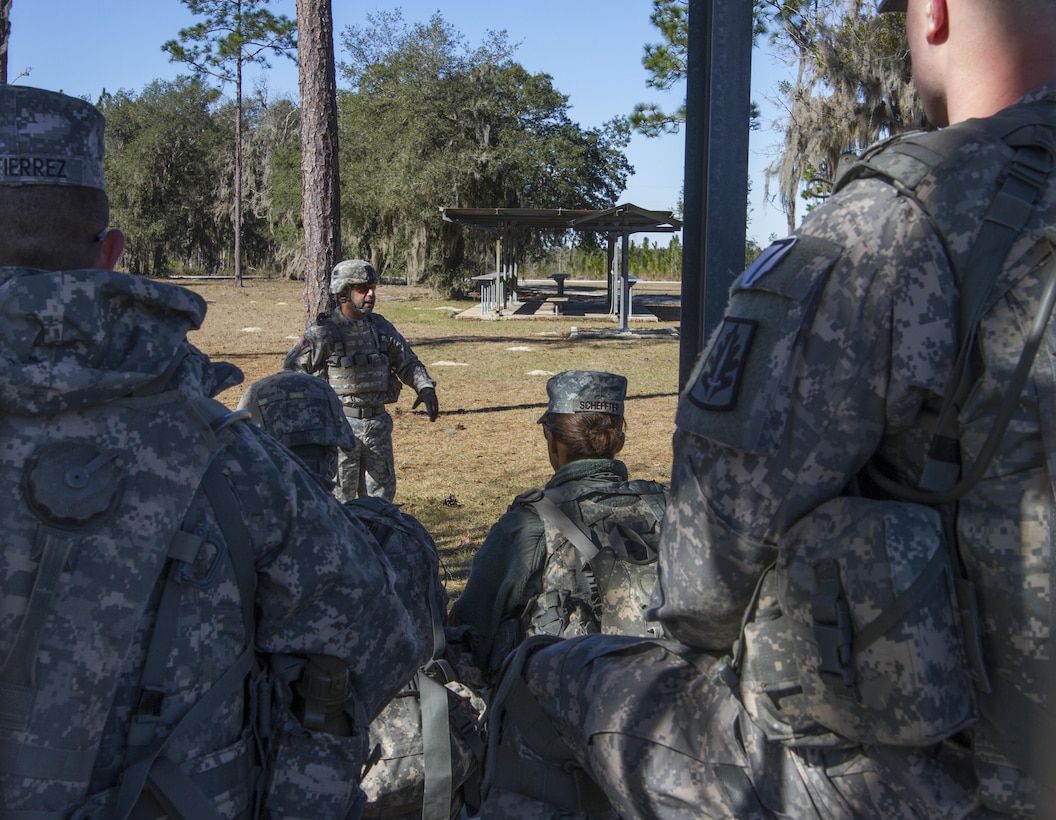 U.S. Army Reserve Staff Sgt. Gregory Valdez, a signal support systems specialist with the 200th MP Command from Chesapeake, Va., gives instructions prior to weapons qualification Feb. 10 at the command's 2016 Best Warrior Competition at Camp Blanding, Fla. The winning noncommissioned officer and junior enlisted competitors will move on to the U.S. Army Reserve Command Best Warrior Competition in May. (U.S. Army photo by Sgt. 1st Class Jacob Boyer/Released)