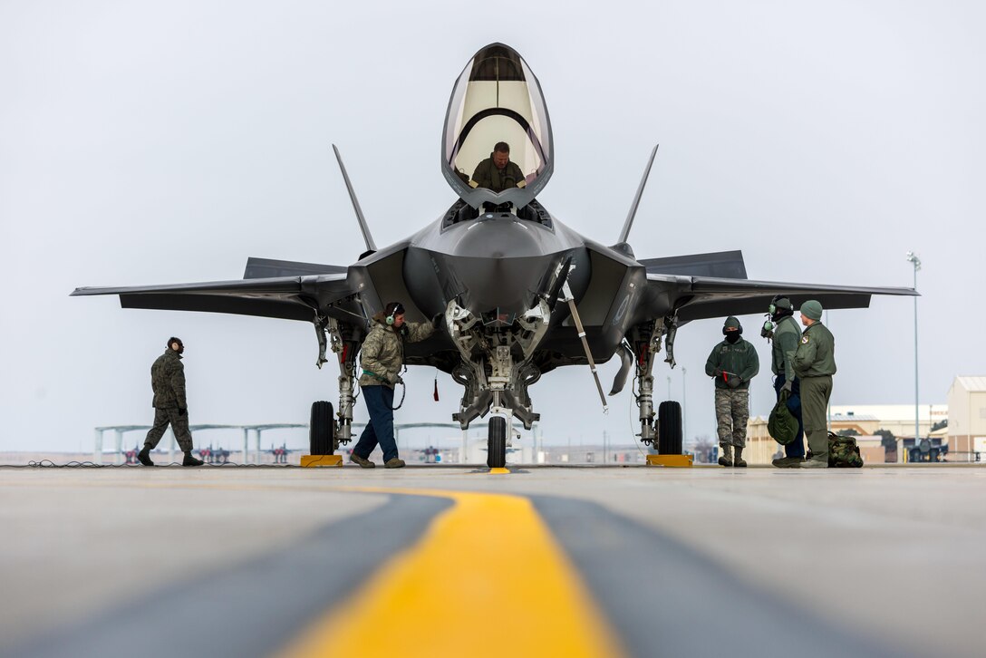 An F-35A Lightning II team parks the aircraft for the first time at Mountain Home Air Force Base, Idaho, Feb. 8, 2016. The aircraft traveled to the base to conduct operational testing to determine its combat capabilities. Air Force photo by Airman 1st Class Connor J. Marth