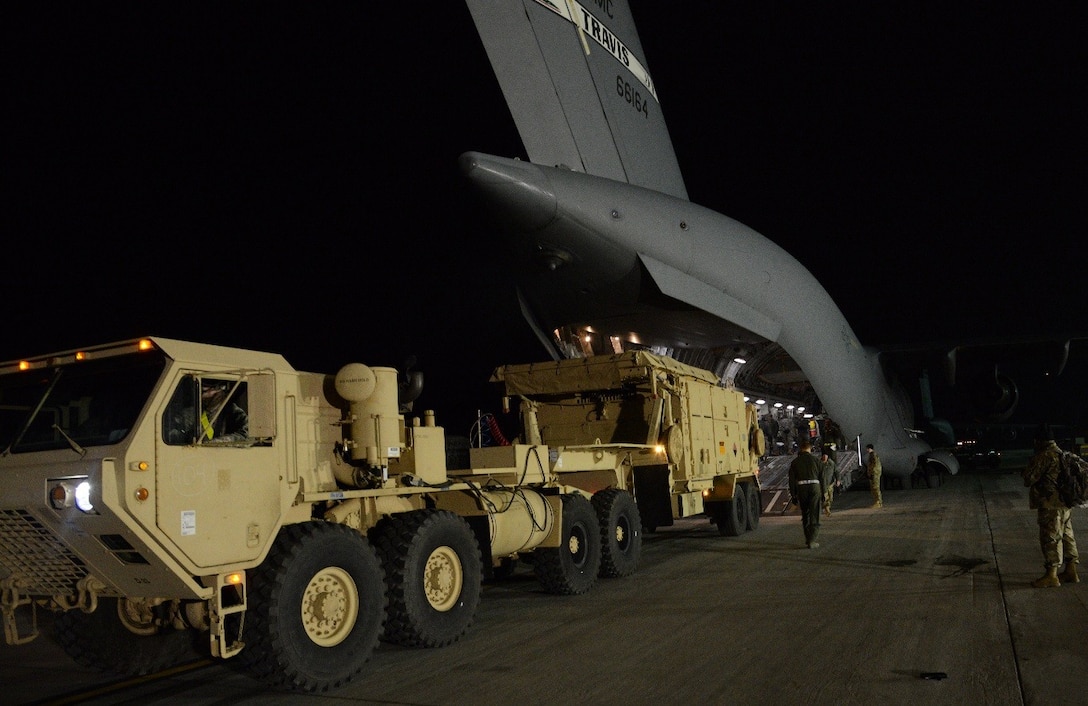 Soldiers from Delta Battery, 1st Battalion, 43rd Artillery Regiment unload an AN/MPQ-65 Patriot radar set from a C-17 cargo plane at Osan Air Base, Feb. 8, as part of a rotational deployment. The rapid deployment of a Patriot to the ROK demonstrates the readiness and extensive capabilities of U.S. forces as well as its commitment to maintain stability and security on the peninsula. (U.S. Air Force photo/Tech. Sgt. Travis Edwards)