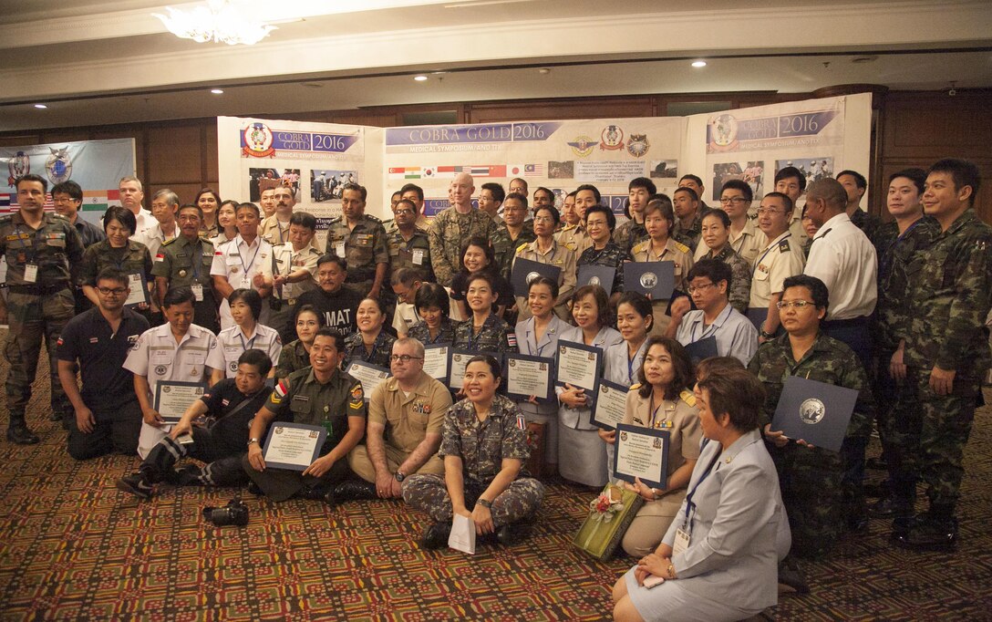 Members and participants of the Exercise Cobra Gold 16 Medical Symposium pose for one last group photo Feb. 12 at the K.P. Grand Hotel, Chanthaburi, Thailand. The symposium, Feb. 9-12, focused on the exchange of knowledge and techniques about humanitarian assistance disaster response. The main goal of the symposium was to raise the level of awareness, understanding, and methods for mitigation and prevention of new and emerging disease threats.