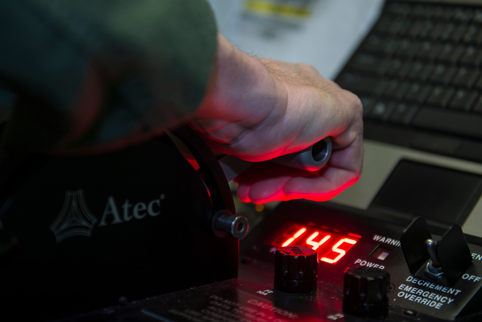 U.S. Air Force Col. Thomas Kunkel, 23d Wing commander, accelerates a throttle during an TF-34 engine run, Feb. 12, 2016, at Moody Air Force Base, Ga. Kunkel rapidly accelerated and decelerated the engine to ‘break in’ engine parts to experience less wear during actual flight. (U.S. Air Force photo by Airman 1st Class Greg Nash/Released) 