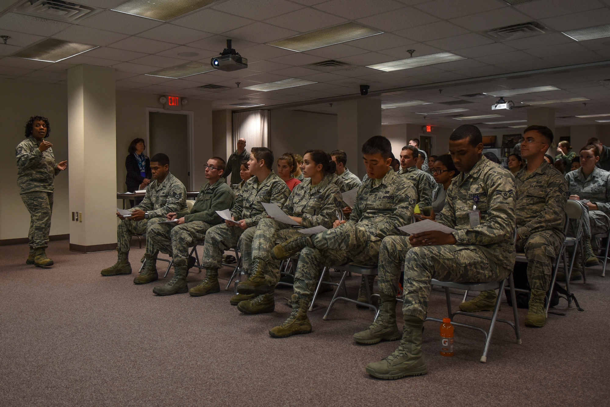 Master Sgt. Angenette Caballero, 4th Force Support Squadron superintendent of education and training, gives an introduction on various ways to commission, Feb. 9, 2016, at Seymour Johnson Air Force Base, North Carolina. More than 50 Airmen attended a briefing about commissioning into several different medical careers fields. (U.S. Air Force photo/Airman Shawna L. Keyes) 