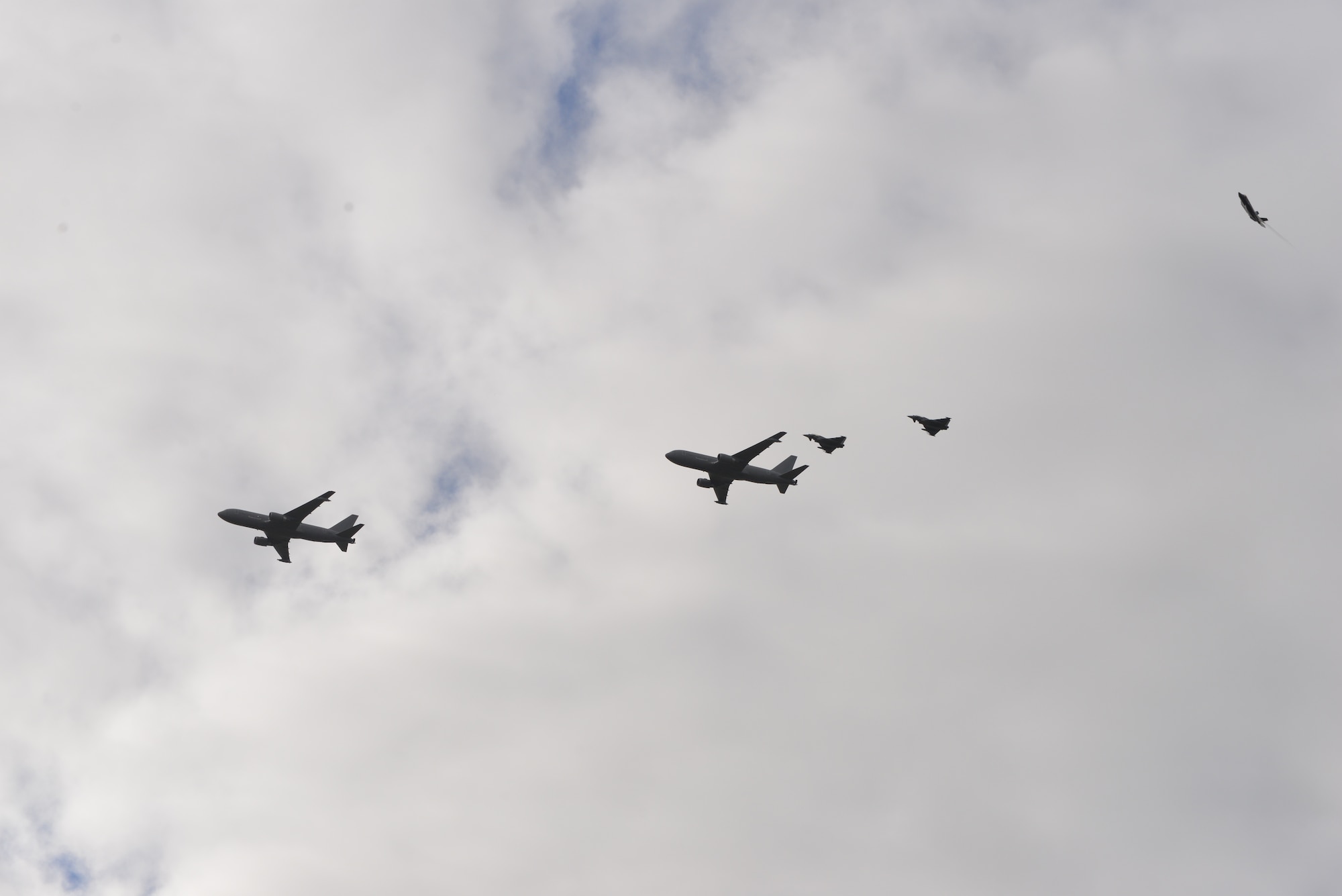 Two Italian Air Force KC-767 aerial refueling tankers, two Typhoon escorts and an Italian Air Force F-35A Lightning II pass over the airfield on February 3, 2016 at Lajes Field, Azores Portugal. The Italian F-35A Lightning II refueled at Lajes Field on the first trans-Atlantic Ocean crossing from Cameri, Air Base Italy to Naval Air Station Patuxent River, Md., Feb 3-5.  (U.S. Air Force photo by Ricky Baptista/Released)
