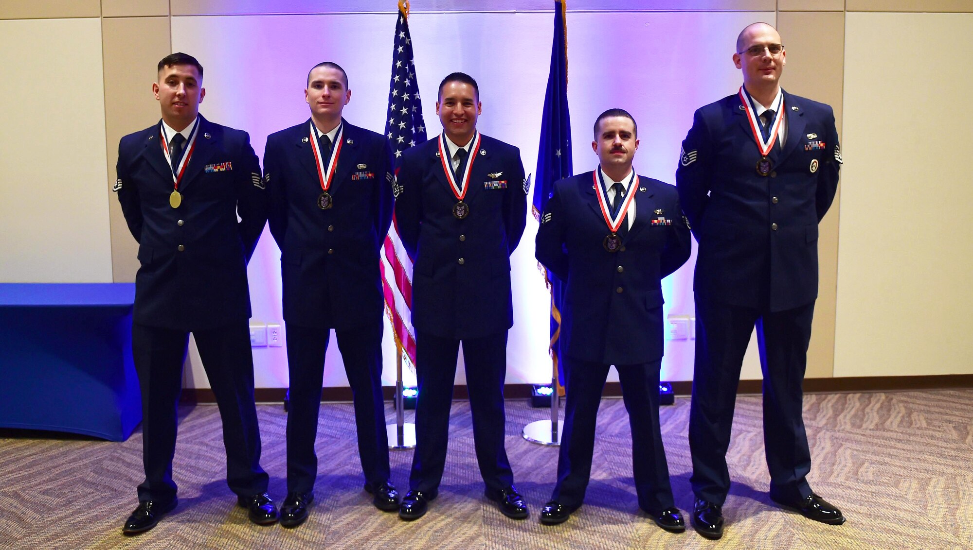 Members of Buckley Airman Leadership School Class 16-B stand together after their graduation and then promotion to staff sergeant Feb. 11, 2016, at the Leadership Development Center on Buckley Air Force Base, Colo. This graduation represents an important part of the enlisted force professional military education, teaching valuable skills required for supervisors. (U.S. Air Force photo by Airman 1st Class Gabrielle Spradling/Released)