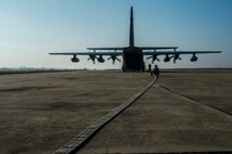 Members of the 100th Logistics Readiness Squadron connect a fuel hose to an MC-130J Commando II, assigned to the 67th Special Operations Squadron, during forward area refueling point training at Plovdiv, Bulgaria, Feb. 9, 2016. The aircraft traveled to Bulgaria in support of Operation Atlantic Resolve to bolster air power capabilities while assuring the U.S. commitment to European security and stability. (U.S. Air Force photo by Airman 1st Class Luke Kitterman/Released)