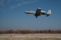 A 74th Expeditionary Fighter Squadron A-10C Thunderbolt II aircraft performs a low-level flyover of an austere landing site at Plovdiv, Bulgaria, Feb. 9, 2016. The aircraft deployed to Bulgaria in support of Operation Atlantic Resolve to bolster air power capabilities while assuring the U.S. commitment to European security and stability. (U.S. Air Force photo by 1st Lt Chris Sullivan/Released)
