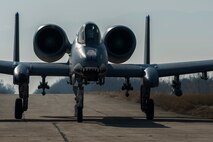 A 74th Expeditionary Fighter Squadron A-10C Thunderbolt II aircraft pilot taxis down a runway before refueling at Plovdiv, Bulgaria, Feb. 9, 2016. The aircraft conducted austere landing training along with forward area refueling point training to bolster air power capabilities while assuring the U.S. commitment to European security and stability. (U.S. Air Force photo by Airman 1st Class Luke Kitterman/Released)