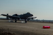 A 74th Expeditionary Fighter Squadron A-10C Thunderbolt II aircraft lands on an unimproved surface during an austere landing training exercise at Plovdiv, Bulgaria, Feb. 9, 2016. The rugged surface conditions of the runway allow pilots to closely simulate possible landing conditions in a deployed environment. (U.S. Air Force photo by Airman 1st Class Luke Kitterman/Released)