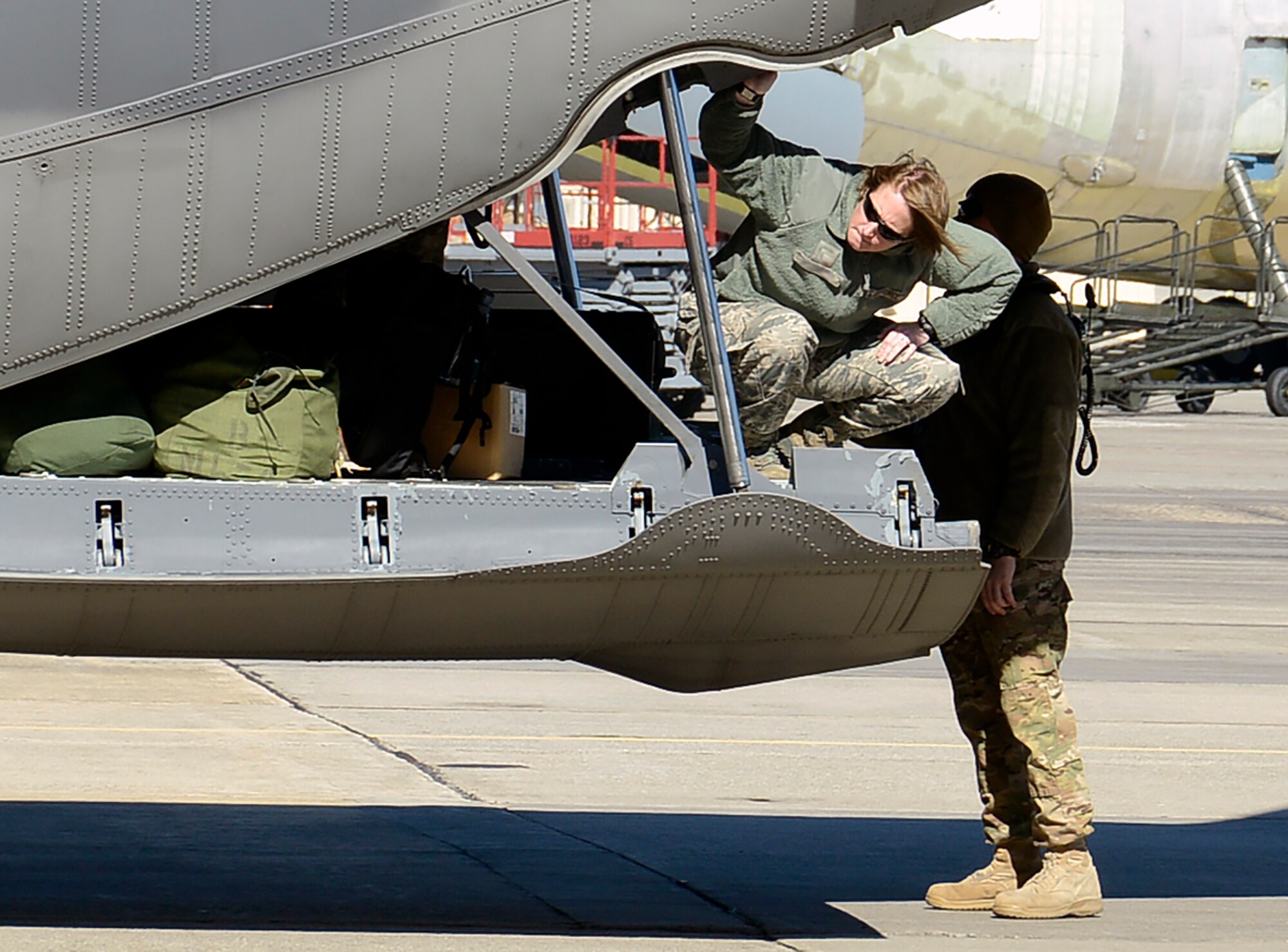 An Air Force Special Operations Command aircrew arrives at Robins Air Force Base. Maj. Gen. Eugene Haase, AFSOC vice commander, addressed the Robins workforce after landing. The crew talked to Robins employees, sharing stories and talking about their responsibilities flying the aircraft. (U.S. Air Force photo by Ed Aspera)