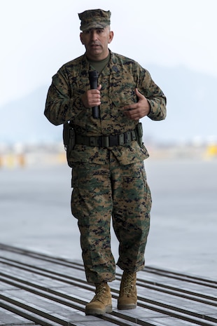 Sgt. Maj. Sergio MartinezRuiz, outbound Marine Aircraft Group 12 sergeant major, addresses the audience during his relief and appointment ceremony at the Marine Corps Air Station Iwakuni, Japan, Feb. 5, 2016. This ceremony symbolizes the end of MartinezRuiz’s tour after assuming the role of MAG-12’s sergeant major in May of 2014.