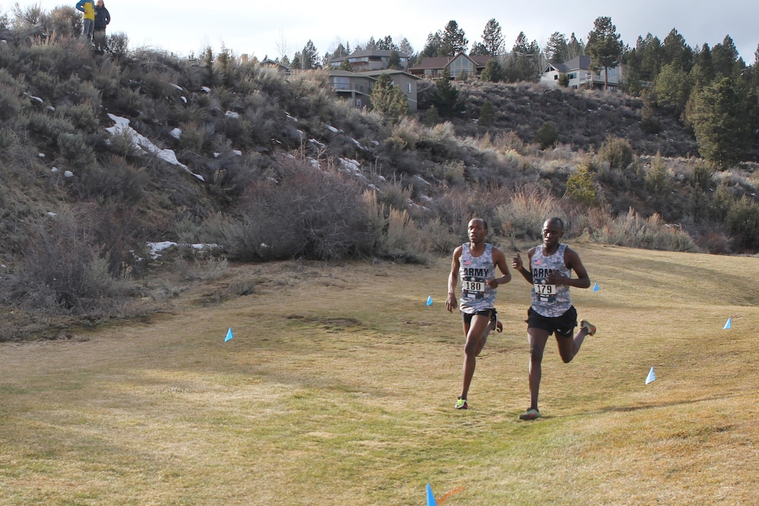 Army Specialists and brothers, Hillary (No. 180) and Emmanuel Bor (No. 179) take Armed Forces Men's gold and silver respectively and leading Army to their third straight Armed Forces Men's Cross Country title.  Hillary Bor finished with a time of 32:37 with his brother clipping his heals at 32:39.  