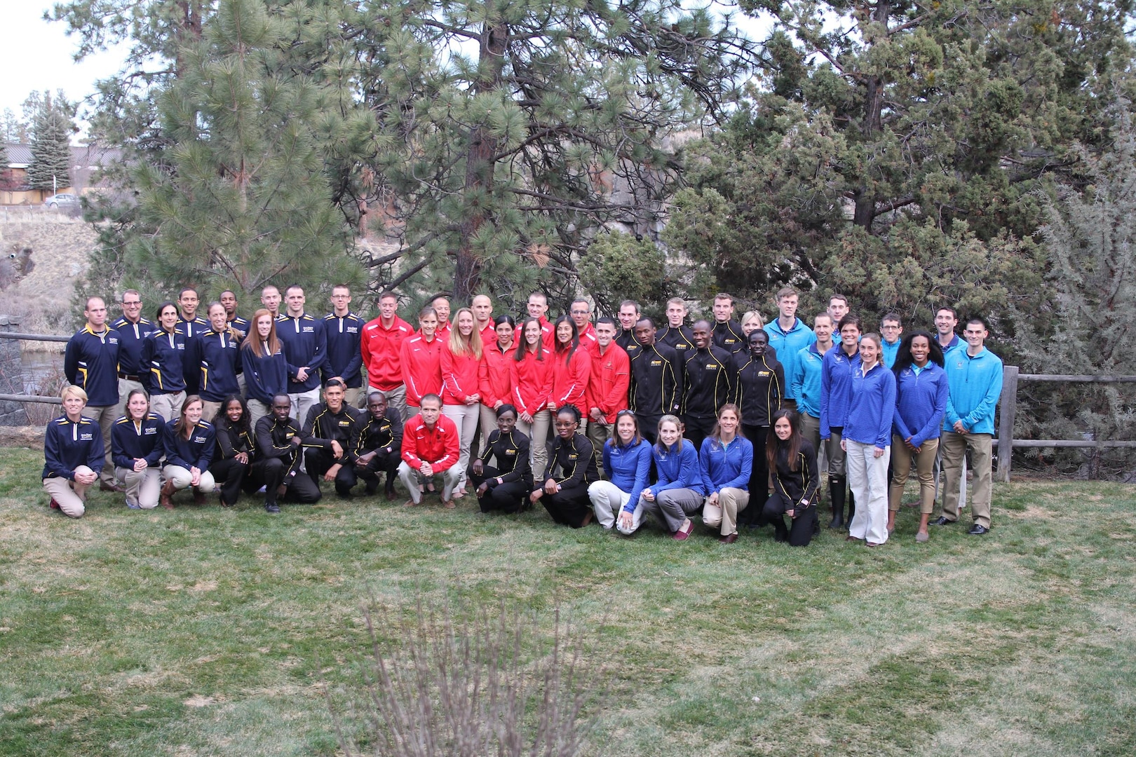 Service teams from the Army, Marine Corps, Navy and Air Force gather together for a group photo.  The 2016 Armed Forces Cross Country Championship was held in conjunction with the USA Track and Field National Championship in Bend, Ore.  Army Men and Women teams swept the team competitions.  Army Men captured their third straight title with the Women repeating their 2015 performance.  Photo by Tom Higgins, Army Sports