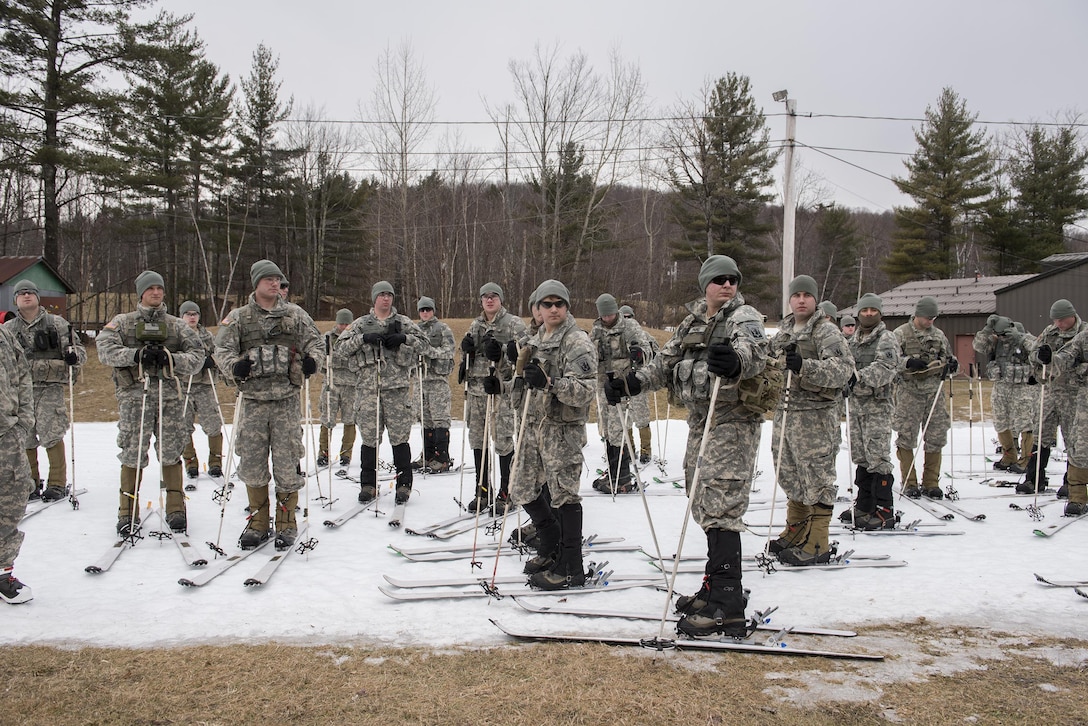 Soldiers receive a safety and mission brief before participating in a cross-country skiing training event at Ethan Allen Firing Range, Jericho, Vt., Feb. 6, 2016. The soldiers, assigned to the Vermont National Guard’s Company A, 172nd Infantry Regiment, 86th Infantry Brigade Combat Team, Mountain, took part in a combination of skiing and live-fire exercises, testing not only their abilities to ski and shoot, but also their ability to shoot under stress with unfamiliar weapons. Vermont Army National Guard photo by Tech. Sgt. Sarah Mattison