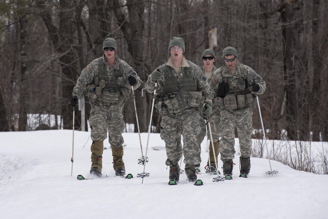 Soldiers look ahead on the course while participating in cross-country skiing at Ethan Allen Firing Range, Jericho, Vt., Feb. 6, 2016. Vermont Army National Guard photo by Tech. Sgt. Sarah Mattison