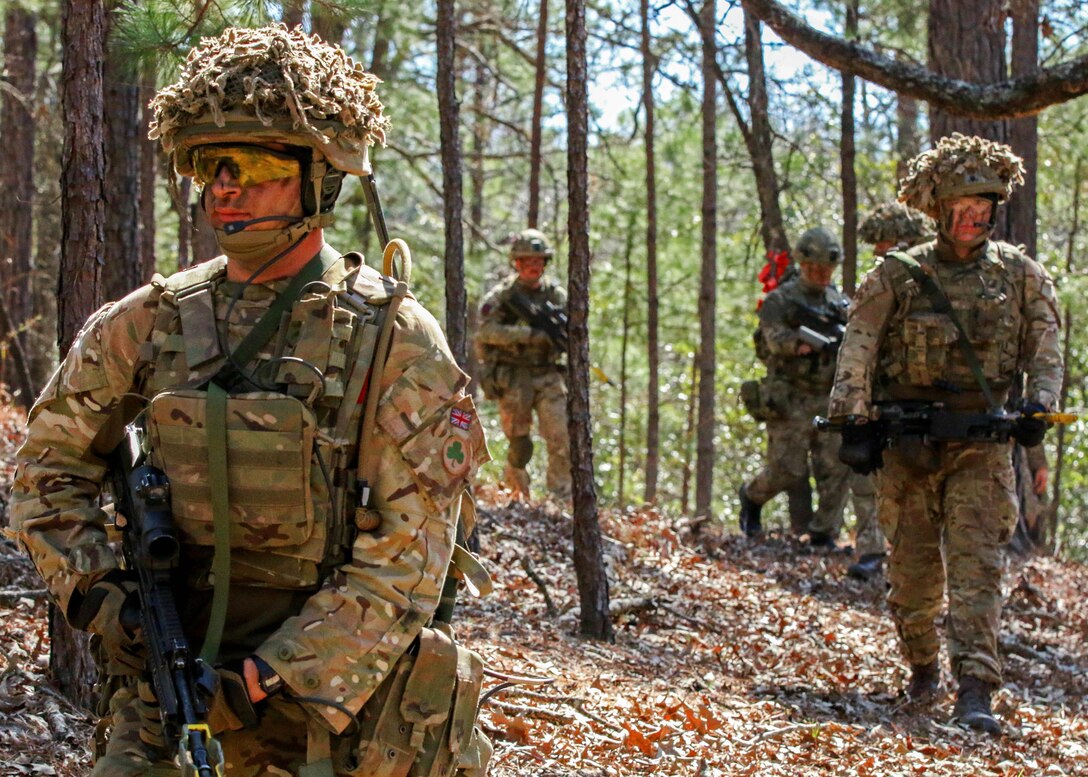British soldiers and U.S. paratroopers move to assault Objective Tarantula during training at the Joint Readiness Training Center’s Peason Ridge on Fort Polk, La., Feb. 13, 2016. The British soldiers are assigned to 3rd Battalion The Rifles, and the paratroopers are assigned to the 25th Infantry Division’s 1st Battalion, 501st Infantry Regiment, 4th Brigade Combat Team, Airborne. Army photo by Staff Sgt. Sean Brady