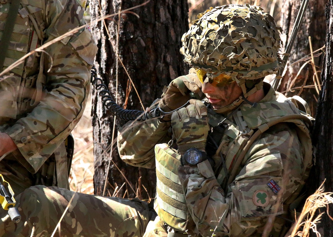 British soldiers and U.S. paratroopers move through forests to assault Objective Tarantula at the Joint Readiness Training Center’s Peason Ridge on Fort Polk, La., Feb. 13, 2016. Army photo by Staff Sgt. Sean Brady