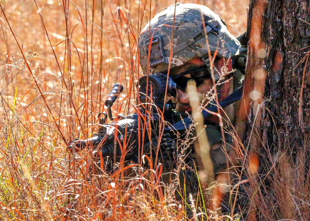 A paratrooper provides security while scanning his sector for opposing forces while moving toward an objective at the Joint Readiness Training Center’s Peason Ridge on Fort Polk, La., Feb. 13, 2016. Army photo by Staff Sgt. Sean Brady