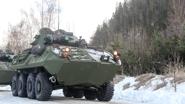 A light armored vehicle awaits transportation by rail at Hell Station in Hell, Norway, Feb. 12, 2016. The rail operations were in preparation for Exercise Cold Response 16, comprised of 13 allied and partner nations, and over 16,000 troops, starting later this month. 