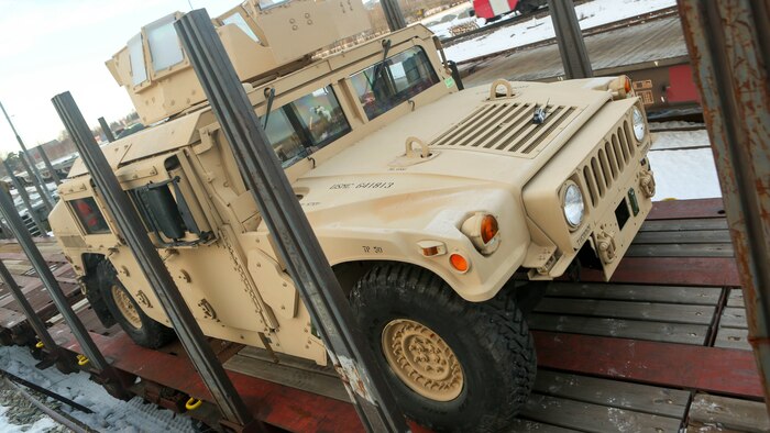 A Humvee pulls onto a railcar at Hell Station in Hell, Norway Feb. 12, 2016, for transportation to Rena, Norway, where the 2nd Marine Expeditionary Brigade’s ground combat element will take part in live-fire exercise in the coming days. The rail operations moved vehicles and equipment prepositioned in caves here to the training area in preparation for Exercise Cold Response 16, comprised of 13 allied and partner nations, and over 16,000 troops, starting later this month. 