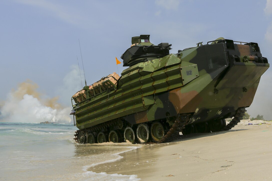U.S. Marine Corps Assault Amphibious Vehicles come ashore in an amphibious capabilities demonstration at Hat Yao, Rayong, Thailand, during exercise Cobra Gold, Feb. 12, 2016.  Cobra Gold is a multinational training exercise developed to strengthen security and interoperability between the Kingdom of Thailand, the U.S. and other participating nations.