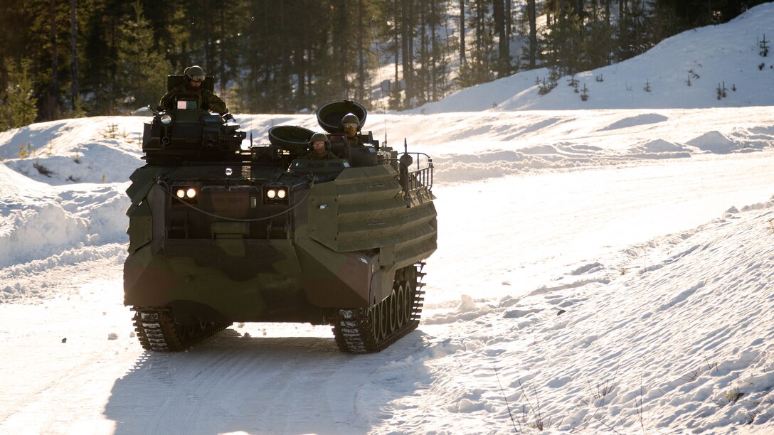 The Norwegian Telemark Battalion instructs U.S. Marine amphibious assault vehicle personnel from 2nd Amphibious Assault Battalion on techniques of driving tracked vehicles in winter conditions on an ice track in Rena, Norway, Feb. 15. In the weeks leading up to exercise Cold Response 16, at the end of the month, the two nations will conduct bilateral training to improve U.S. Marine Corps capability to operate in cold-weather environments.