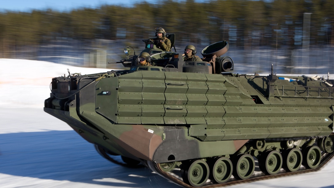 A crew of three U.S. Marines try to maintain control while speeding around an ice track designed to test their ability to control a slide while maneuvering the 29-ton vehicle through obstacles. The Norwegian Telemark Battalion instructs U.S. Marine amphibious assault vehicle personnel from 2nd Amphibious Assault Battalion on techniques of driving tracked vehicles in winter conditions on an ice track in Rena, Norway, Feb. 15. In the weeks leading up to exercise Cold Response 16, at the end of the month, the two nations will conduct bilateral training to improve U.S. Marine Corps capability to operate in cold-weather environments.