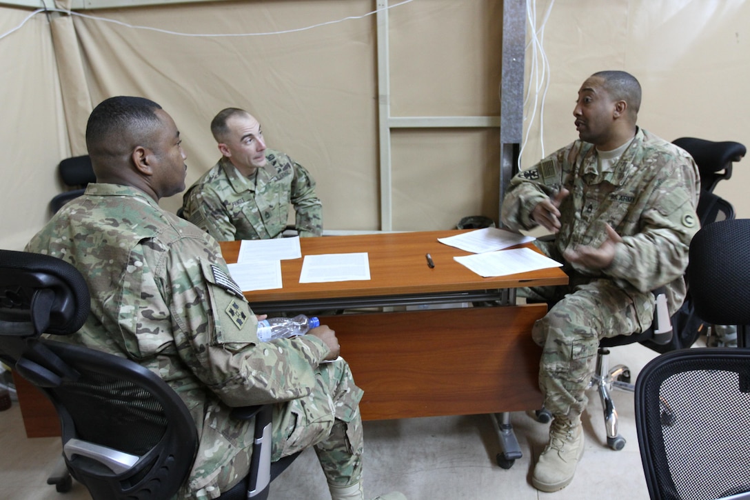 1st Sustainment Command (Theater)SHARP instructor, Sgt. 1st Class Dontavious Seales, holds a discussion on a case study with two SHARP Foundation Course students.  He has taught several classes since being with the 1st TSC, both at Fort Bragg and in the Army Central AOR.