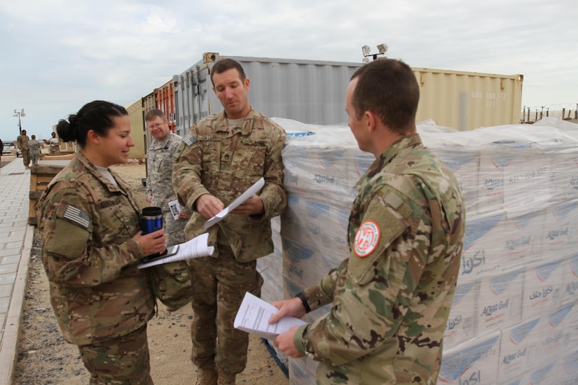 Staff Sgt. Sorrina Gonzalez, 4th Sustainment Command (Expeditionary) administrative assistant to the commanding general, reviews SHARP Foundation Course materials with her classmates as they prepare for their tests, based on case scenarios. Gonzalez says the course gave her a better understanding of how to handle certain situations and to address the issue as it arises.