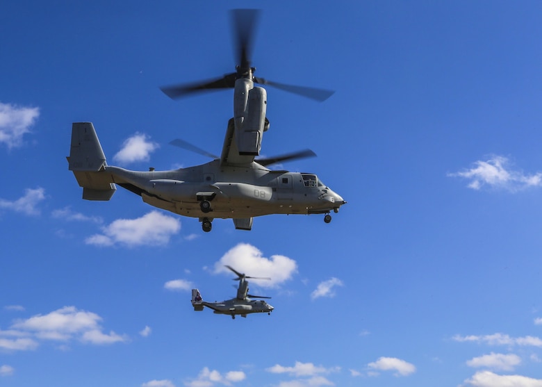 Marine Medium Tiltrotor Squadron 365 conducts section confined area landings with MV-22B Ospreys, Feb. 10, 2016. Marines with VMM-365, out of Marine Corps Air Station New River, N.C.,  flew to a landing zone, which allowed pilots to practice CALs in their Osprey’s and then flew several miles off the coast to practice shooting the M2 Browning .50-caliber machine gun from the back of the aircraft. (U.S. Marine Corp photo by Lance Cpl. Aaron K. Fiala/Released)