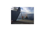 Soldiers of the 481st Transportation Company (Heavy Boat), Naval Base Ventura County, Port Hueneme, aboard the United States Army Vessel Malvern Hill, position a floating target before conducting a live fire exercise, also known to Army mariners as a “Wet Range,” where Soldiers engaged targets on the water while their vessel was underway, using various vehicle mounted and hand carried weapons Jan. 27. (Photo by Lt. Col. Kevin McKenzie)