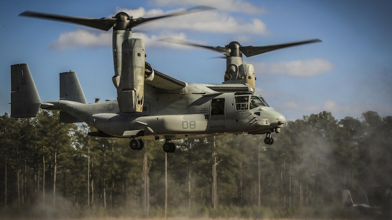 Maj. Steven R. Huls and Capt. Edward K. Williams navigate a MV-22B Osprey into a landing zone during section confined area landings near Marine Corps Air Station New River, N.C., Feb. 10, 2016. Marines with VMM-365 flew to a landing zone, which allowed pilots to practice CALs in their Osprey’s and then flew several miles off the coast to practice their proficiency with shooting the M2 Browning .50-caliber machine gun. Huls and Williams are pilots with Marine Medium Tiltrotor Squadron 365. 
