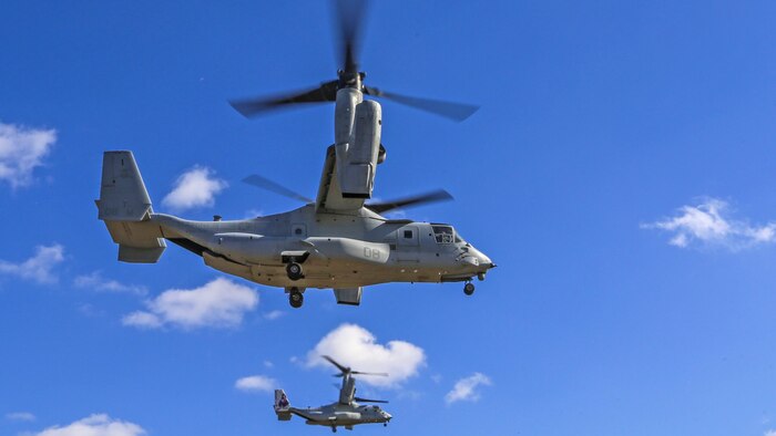 Marine Medium Tiltrotor Squadron 365 conducts section confined area landings with MV-22B Ospreys, Feb. 10, 2016. Marines with VMM-365, out of Marine Corps Air Station New River, N.C.,  flew to a landing zone, which allowed pilots to practice CALs in their Osprey’s and then flew several miles off the coast to practice shooting the M2 Browning .50-caliber machine gun from the back of the aircraft. 