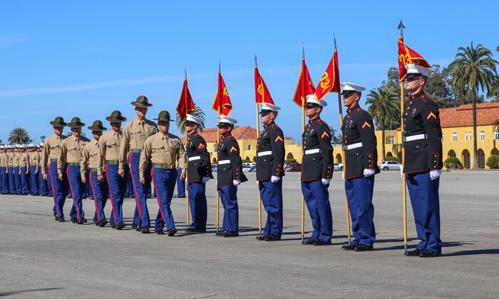 The company honormen from Bravo Company, 1st Recruit Training Battalion, retire the guidons to their drill instructors during the graduation ceremony at Marine Corps Recruit Depot San Diego, Feb. 12. Graduation takes place at the completion of a 13-week transformation including training in drill, marksmanship, basic combat skills and Marine Corps customs and traditions. Annually, more than 17,000 males recruited from the Western Recruiting Region are trained at MCRD San Diego.